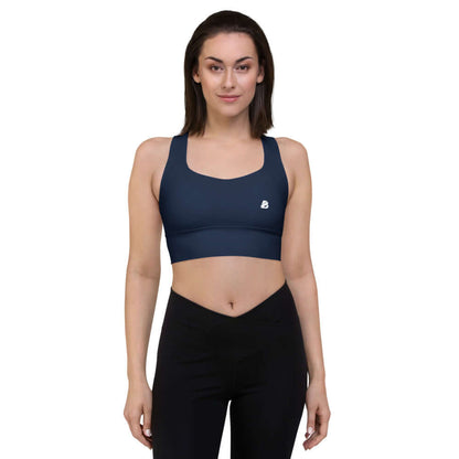 Model wearing Longline-Sport-BH N°3, ideal for jogging, jumping, or as streetwear, offering support with dense fabric and shoulder straps.