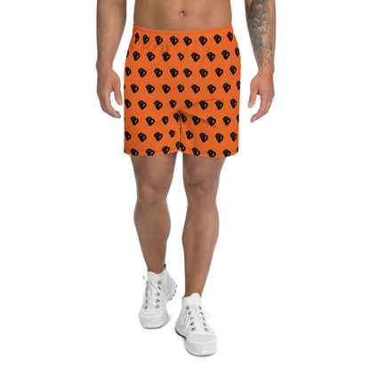 Model wearing Lange Allover-Sport-Shorts für Herren N°4, ideal for running, swimming, and workouts; features orange color and black pattern.