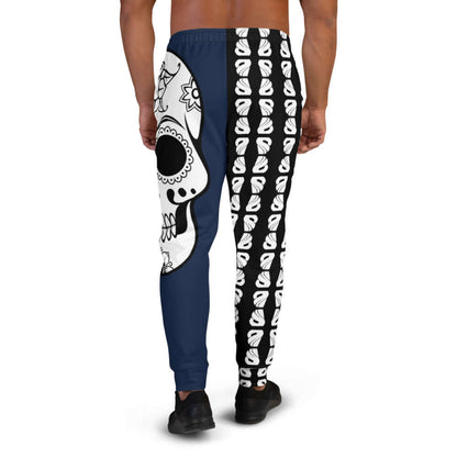 Back view of model wearing Herren-Jogginghose N°7 with unique skull and pattern design, ideal for jogging and lounging.