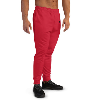 Herren-Jogginghose N°6 in Rot, weiche Baumwollmischung, ideal zum Joggen oder Entspannen, seitlich abgebildet auf einem Modell.