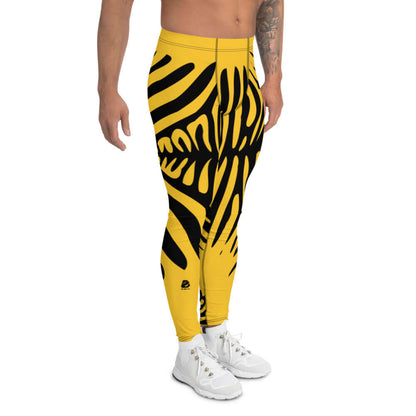 Model wearing yellow Herren-Leggings N°0 with black abstract pattern, showcasing four-way stretch fabric and comfort fit for men.