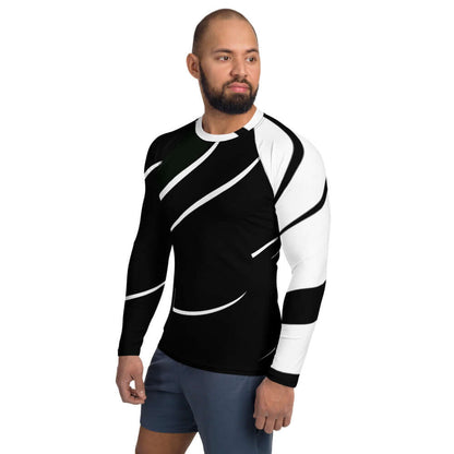 Man wearing black and white Herren-Rash-Guard N°3 with ergonomic sleeves and flat seams for sun protection and comfort.
