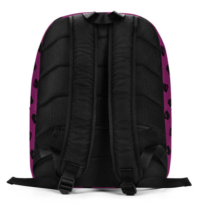 Back view of Minimalistischer Rucksack N°11 showing adjustable padded straps and hidden compartment on a vibrant purple background.