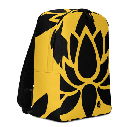 Minimalistischer Rucksack N°1 in gelb-schwarzem Blumendesign, ideal für sicheren Transport mit Laptopfach und verstecktem Fach.