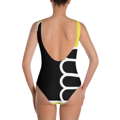Rückansicht des Einteiliger Badeanzug N°19, schmeichelhaftes Design mit niedrigem Rückenausschnitt, ideal für Meer und Pool.