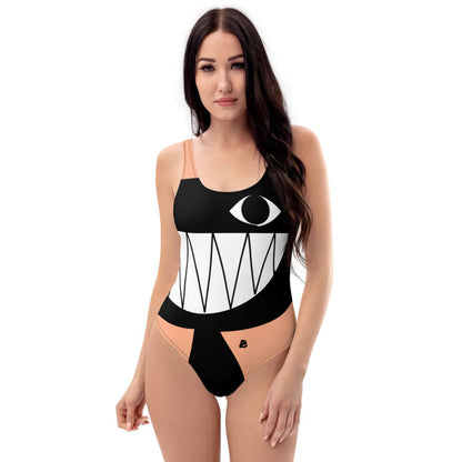 Model wearing Einteiliger Badeanzug N°10 with artistic design, showcasing flattering fit and U-neck style.