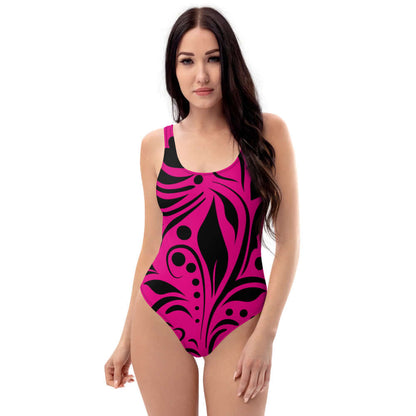 Einteiliger Badeanzug N°11 in leuchtendem Pink mit schwarzem Muster, schmeichelhaftes Design für perfekten Strand- oder Poolauftritt.