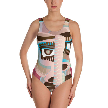 Model wearing Einteiliger Badeanzug N°18 with abstract face design and U-Ausschnitt, ideal for pool or beach with flattering fit.