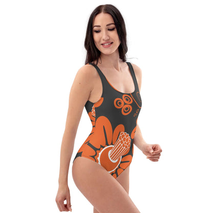 Model wearing Einteiliger Badeanzug N°16 with floral pattern, featuring a flattering fit and smooth fabric for pool or beach.