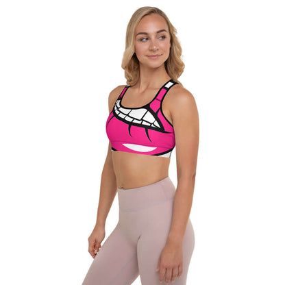 Gepolsterter Sport-BH N°1 in pink, getragen von Frau in sportlicher Haltung, ideal für Workouts, aus feuchtigkeitsabsorbierendem Stoff.