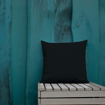 Premium-Kissen N°0 on wooden bench against teal wooden wall, showcasing luxurious home decor and stability, perfect for naps.