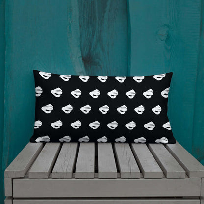 Premium-Kissen N°0 with monochrome pattern on a wooden bench against turquoise wall.