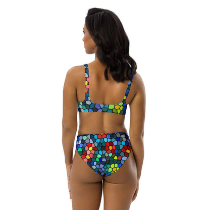 Rear view of model wearing colorful High Waist Bikini N°0 with geometric pattern, featuring removable pads and double-layered fabric.