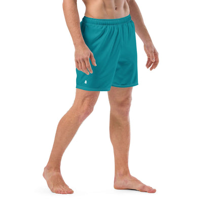 Herren-Badehosen N°10 in vibrant turquoise, featuring quick-dry, breathable fabric with pockets and silky lining for summer comfort.