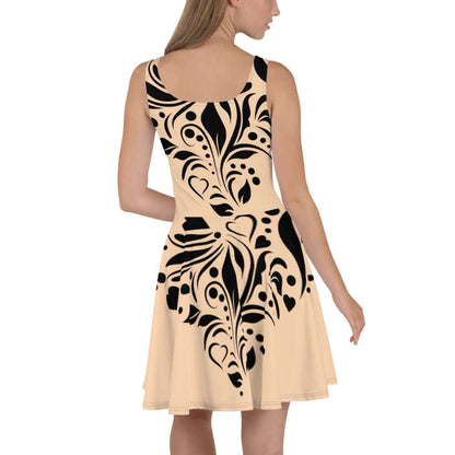 Woman wearing Skater-Kleid N°5 with intricate black pattern on a soft, sleeveless design, featuring a flared skirt.