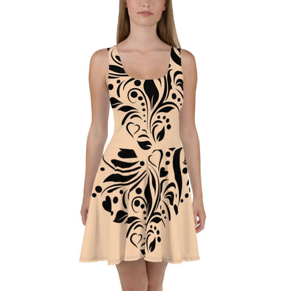 Model wearing Skater-Kleid N°5, a sleeveless dress with elegant flair and intricate black design on smooth, soft fabric.