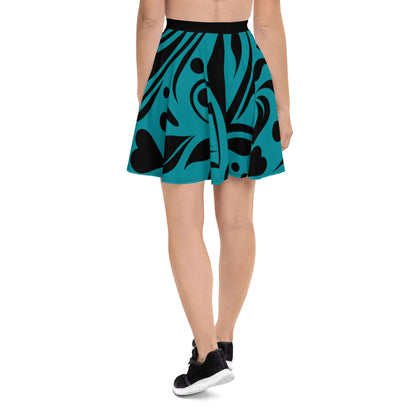 Woman wearing Skater-Rock N°8, black and teal pattern, mid-thigh length with elastic waistband, flattering silhouette for all body types.