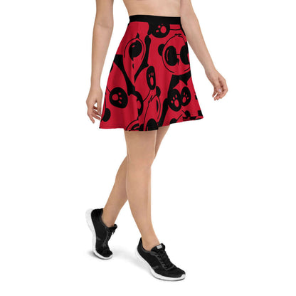 Woman wearing Skater-Rock N°0 with red and black pattern, showcasing the flattering silhouette and comfortable elastic waistband.