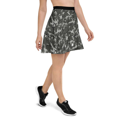 Woman wearing Skater-Rock N°4, camo print skirt with black waistband for a flattering silhouette and comfort.
