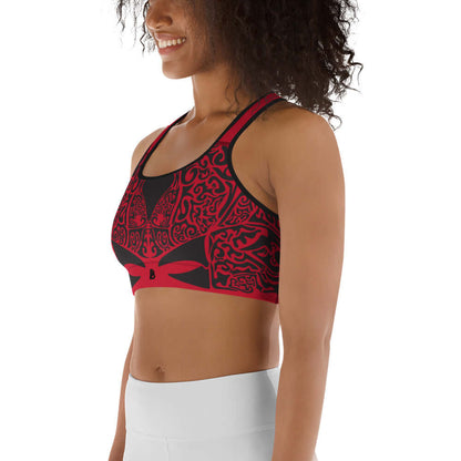 Woman wearing Sport-BH N°2 in red and black design, showcasing moisture-wicking fabric and supportive straps.