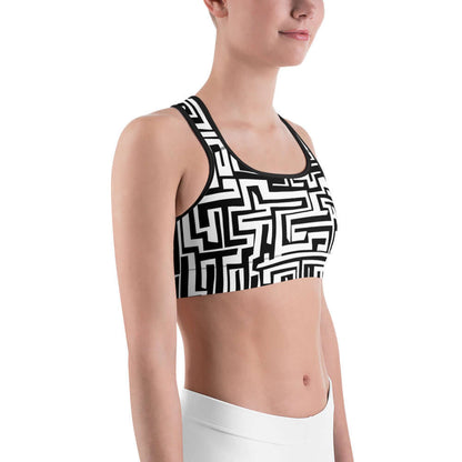Sport-BH N°8 in schwarz-weißem Muster, ideal für leichte bis mittelmäßige Workouts, mit feuchtigkeitsabsorbierendem Material und stützenden Trägern.