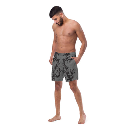 Man wearing Herren-Badehosen N°0, quick-dry swim trunks with multiple pockets and silky lining, ideal for summer.