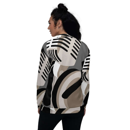 Model wearing Unisex Bomberjacke N°8 with abstract pattern, showcasing stylish back design, perfect for pairing with T-shirts or hoodies.