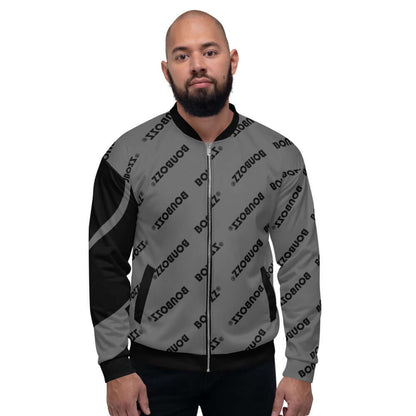 Unisex Bomberjacke N°9 with all-over print, worn by a model showcasing its loose fit and stylish design.