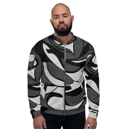 Unisex Bomberjacke N°10 with all-over black and white abstract design, worn by a model with a stylish casual outfit.