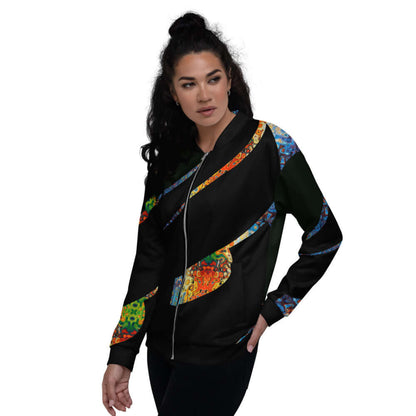 Woman wearing colorful Unisex Bomberjacke N°12 with vibrant patterns, showcasing its stylish design and comfortable fit.