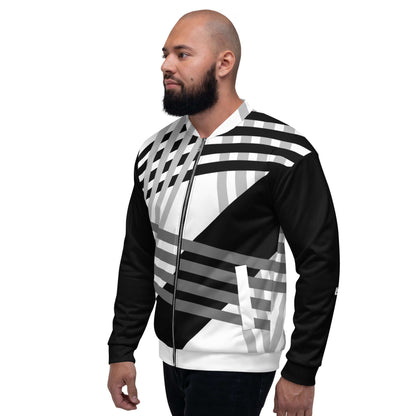 Model wearing Unisex Bomberjacke N°37 with black and white geometric pattern, perfect for any outfit, featuring fleece inside and loose fit.