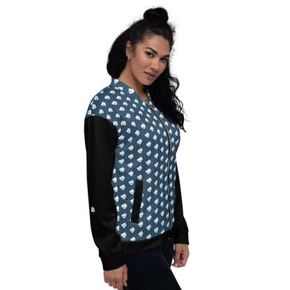 Unisex Bomberjacke N°36 with a stylish all-over print design and black sleeves, modeled by a standing woman.