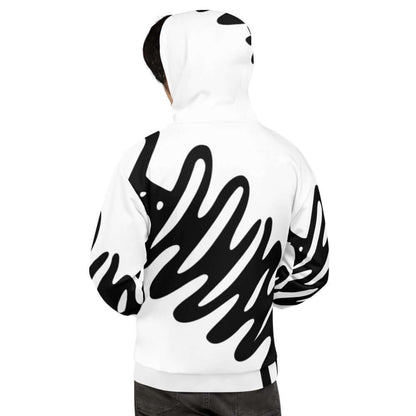 Person wearing Unisex-Kapuzenpullover N°26 with bold black and white pattern, showing soft fleece interior and relaxed fit.