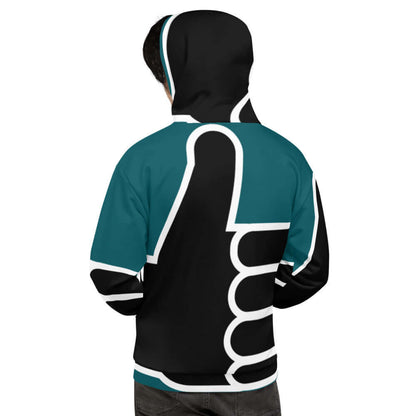 Person wearing Unisex-Kapuzenpullover N°36 with a bold graphic design showing a large thumbs-up symbol.