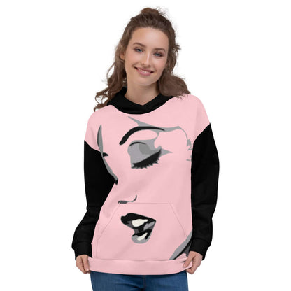 Woman wearing Unisex-Kapuzenpullover N°24 with artistic print, showcasing a soft and stylish design. Ideal for cool evenings.