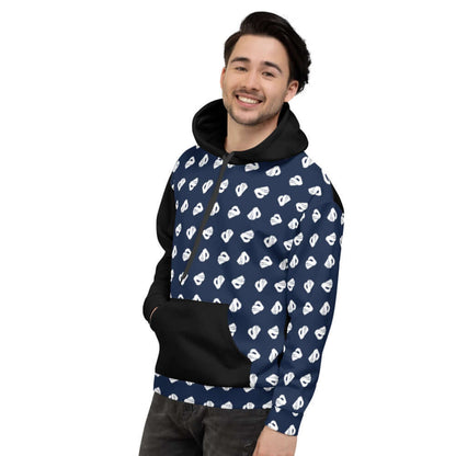 Model wearing Unisex-Kapuzenpullover N°7 with blue and white pattern, showcasing soft fabric and cozy fit.