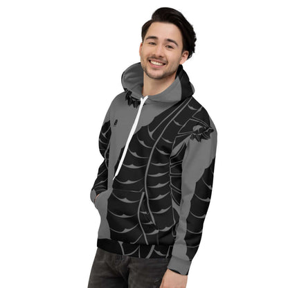Unisex-Kapuzenpullover N°15 mit lebendigem Druck, getragen von einer Person, weich innen und außen, ideal für kühle Abende.