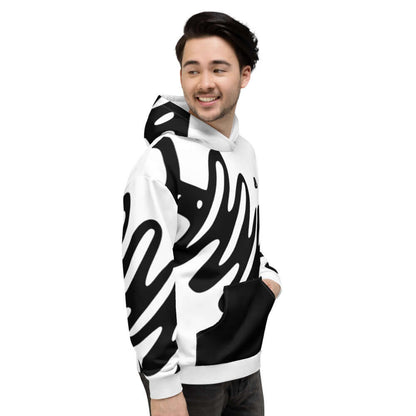 Model wearing Unisex-Kapuzenpullover N°26 with a black and white abstract design.