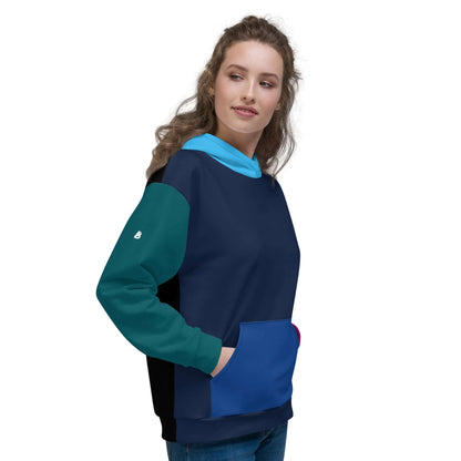 Woman wearing Unisex-Kapuzenpullover N°43 with vibrant print, showing the comfortable fabric and relaxed fit perfect for cool evenings.