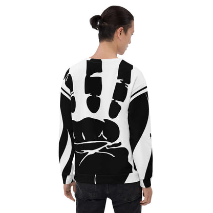 Person wearing Unisex-Pullover N°8 with a black and white abstract design, featuring durable cotton-feel material for long-lasting wear.