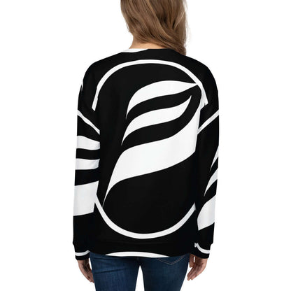 Back view of person wearing Unisex-Pullover N°9 with bold black and white pattern, showcasing precise cut and hand-sewn design.