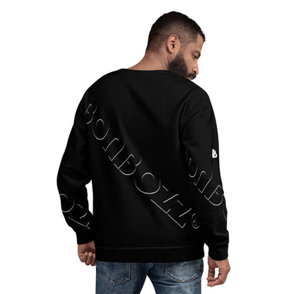 Model wearing Unisex-Pullover N°14, black with unique print, side view showcasing design details and fabric texture of pullover.