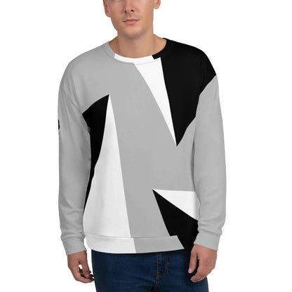 Model wearing Unisex-Pullover N°2 with unique black, gray, and white geometric design, soft material, and cotton feel.