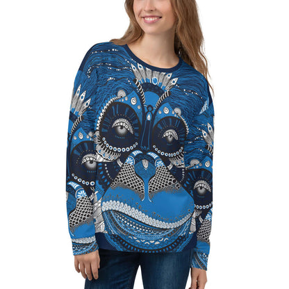 Woman wearing Unisex-Pullover N°4 with intricate blue and white design, soft cotton-feel polyester blend.