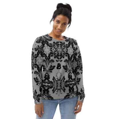 Unisex-Pullover N°28 with intricate black and gray design, modeled by a person, showcasing unique hand-sewn craftsmanship.