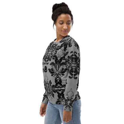 Model wearing Unisex-Pullover N°28, intricately designed, in black and gray patterns, side view, casual and stylish.