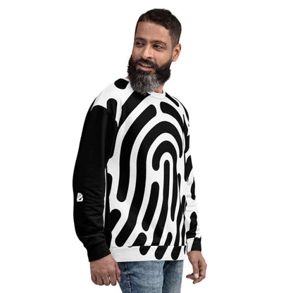 Man wearing black and white Unisex-Pullover N°1 with unique abstract design, showcasing soft brushed fleece and cotton-feel fabric.