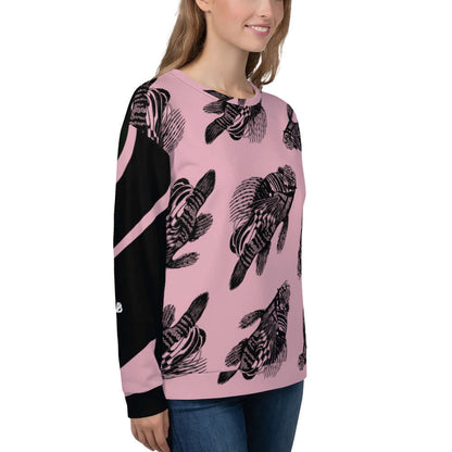Woman wearing Unisex-Pullover N°12 with unique full-print design, showcasing pink and black abstract patterns.