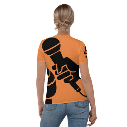 Woman wearing Damen-T-Shirt N°6 in orange with black microphone graphic, showcasing unique design and comfortable fit.