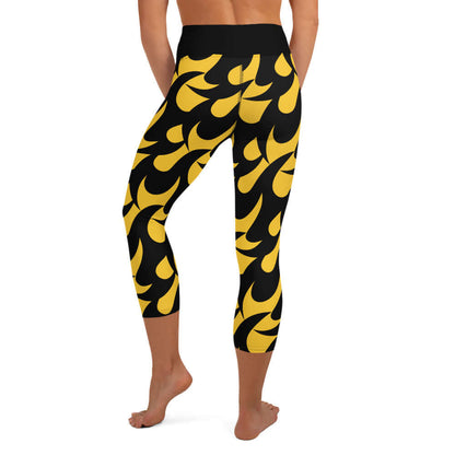 Back view of Yoga-Capri-Leggings N°2 with yellow and black design, high elastic waistband, mid-calf length, ideal for fitness or yoga.